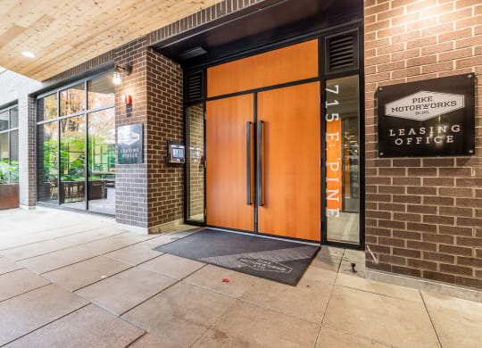 the entrance to the leasing office of the leading office building
