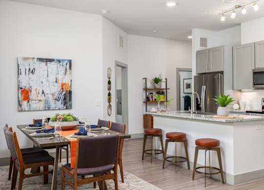 Rhythm High-End Kitchen with Granite Counters and Stainless Steel Appliances