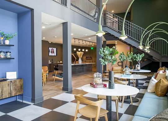 Inspiring and creative game room with fun lighting, rope swings, and more at Novel Cary