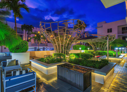 Evening Courtyard Lounge with Sculptural Lighting at South of Atlantic