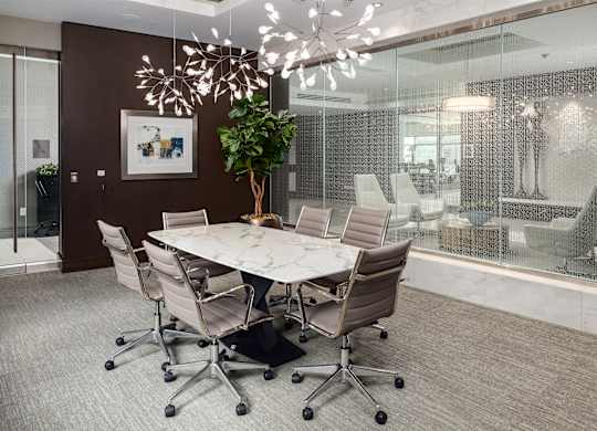 Elegant Business Meeting Room with Designer Chairs and Marble Top Table