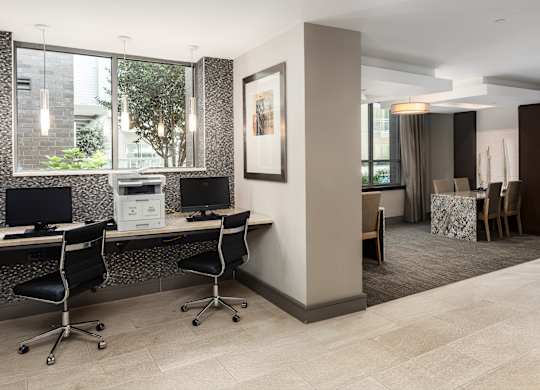 Work-From-Home Ready Space Featuring Computers, Printer, and Natural Light
