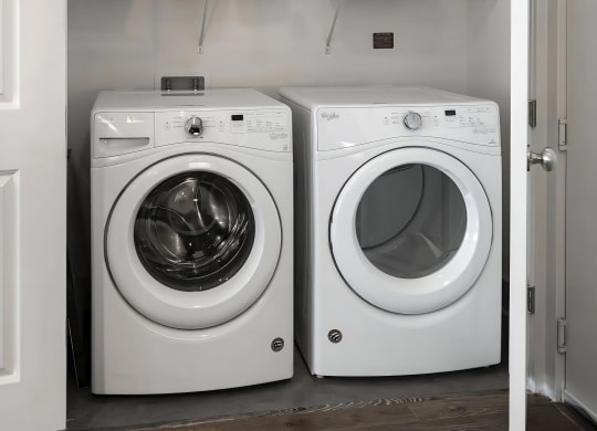 Side-by-Side Front-Loading Laundry Machines in Apartment Unit