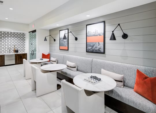 Casual Resident Lounge with Built-In Banquette and Chess Table