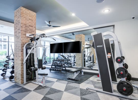 Fitness Center Featuring Weight Machines and Free Weights