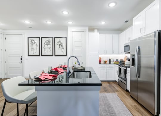 Modern Kitchen With Stainless Steel Appliances and Bar Seating
