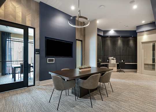 Spacious Resident Workspace with Modern Lighting, Desk Areas & Printer Station