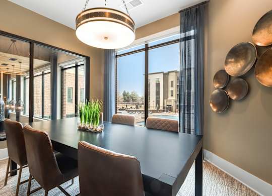 Sleek Private Office Space with Floor-to-Ceiling Windows and Stylish Decor