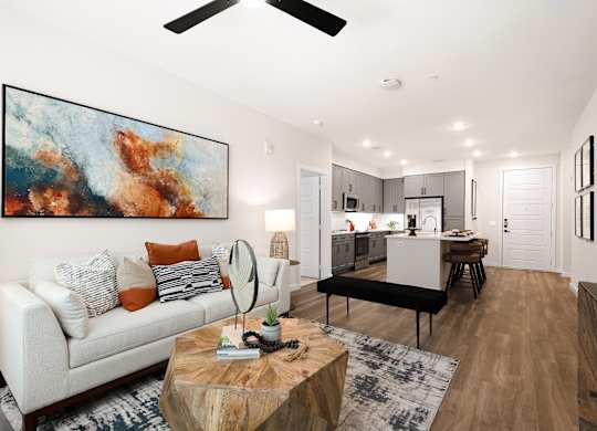 Open-Concept Living Room with Modern Kitchen and Wood-Style Flooring