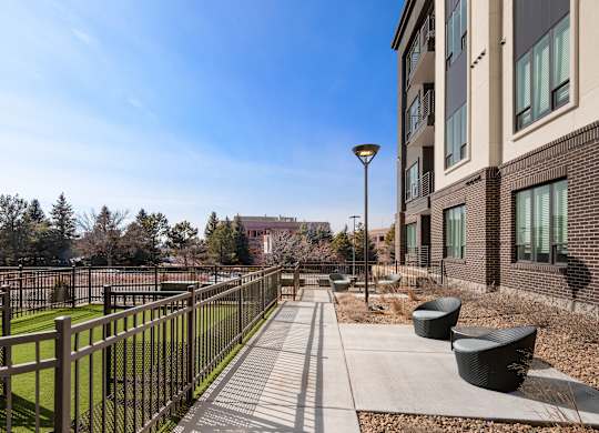Community Green Space with Resident Seating and Secure Pet Areas