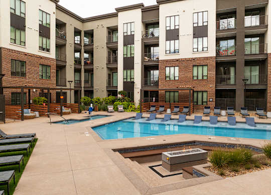 Large Outdoor Pool Area with Firepit