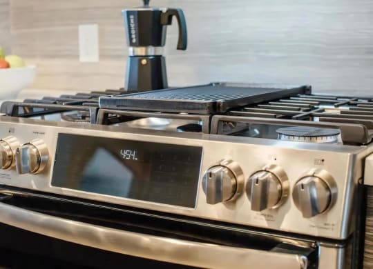 Fully-Equipped Kitchen Featuring Modern Stainless Steel Appliances