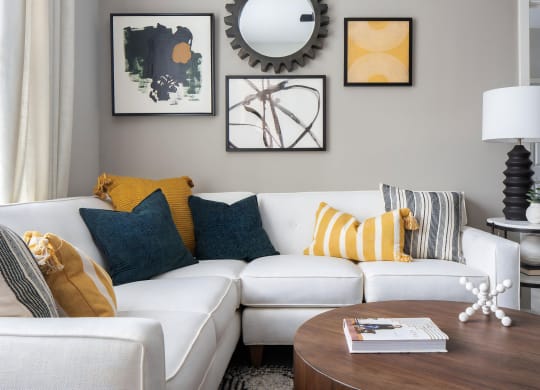 Modern Living Space Featuring Bright Sofa and Accent Wall Gallery