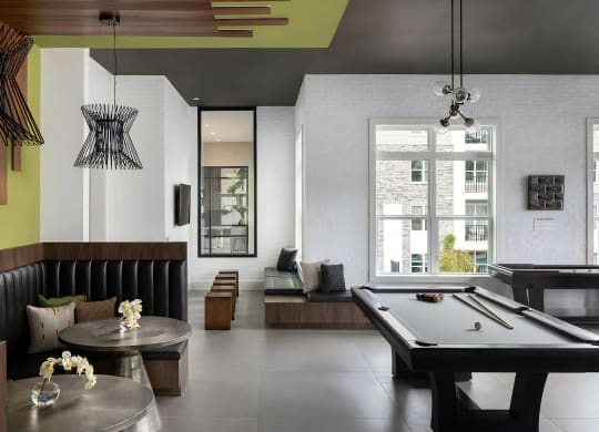 Game Room with Lounge Booths, Pool Table, and Bold Modern Design