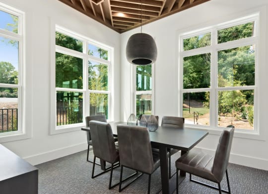 Community Workspace with Large Collaborative Table and Scenic Views