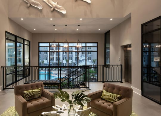 Luxe Clubhouse Lounge with Pool Views Through Floor-to-Ceiling Windows
