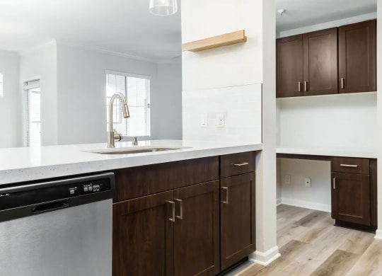 Contemporary Kitchen Design with Pendant Lighting and Open Layout