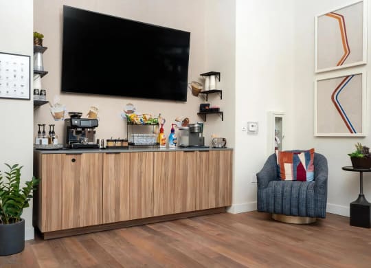 Resident Lounge Featuring Coffee Bar with Snacks and Espresso Machine