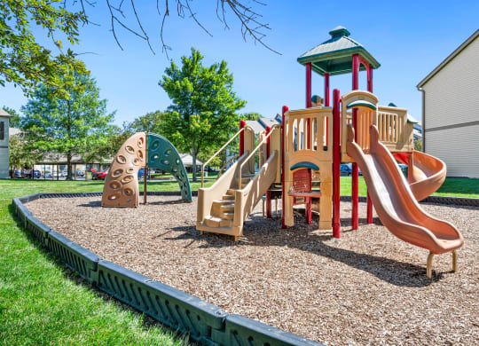 the playground at the flats at big tex apartments