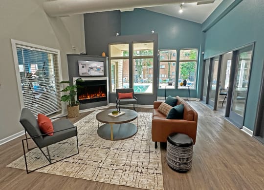 a living room with blue walls and a fireplace