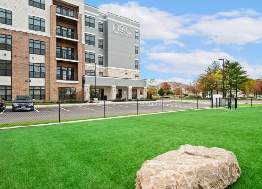 the preserve at green valley apartments exterior view of building and grass