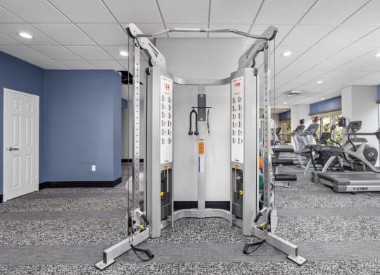a photo of a fitness room with exercise equipment