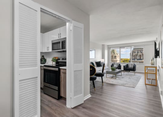 a kitchen and living room in a 555 waverly unit