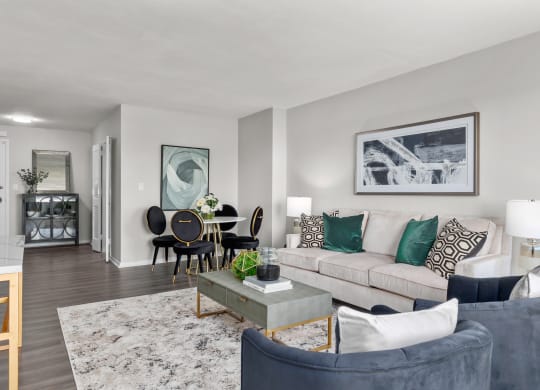 a living room with gray walls and a white couch