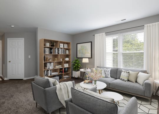 a living room with couches and chairs and a table
