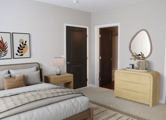 a bedroom with a bed and a dresser with a mirror