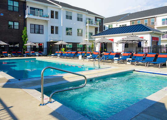 Resort style pool with hot tub and lounge chairs at Fairmont Apartments, Ohio, 43081