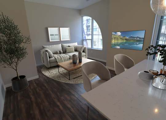 A living room with a couch, chairs, and a coffee table.