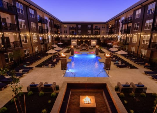 an aerial view of a swimming pool in the middle of an apartment buildingat Taylor House Apartments, Columbus, OH, 43214
