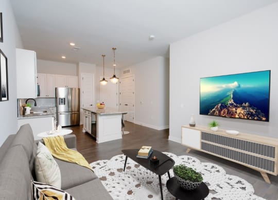 a living room with a couch and a coffee table in front of a tv at Fairfax, Grandview, OH, 43212