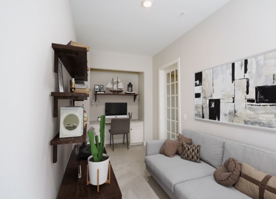 a living room with white walls and a gray couch at Fairfax, Grandview, OH, 43212