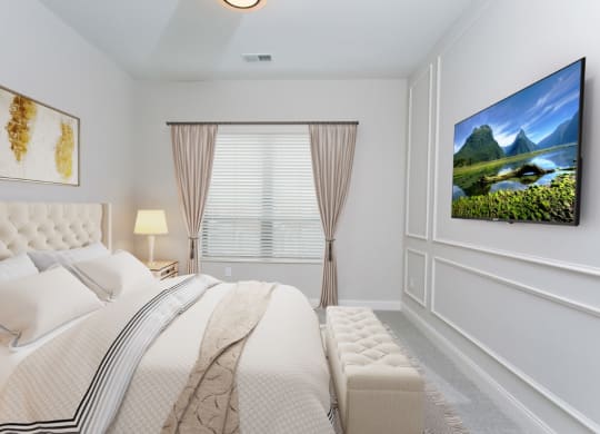 a bedroom with a large bed and a large window at Fairfax, Grandview, OH