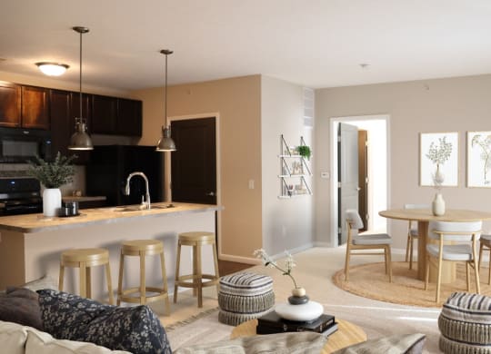 a living room with a kitchen and a dining room