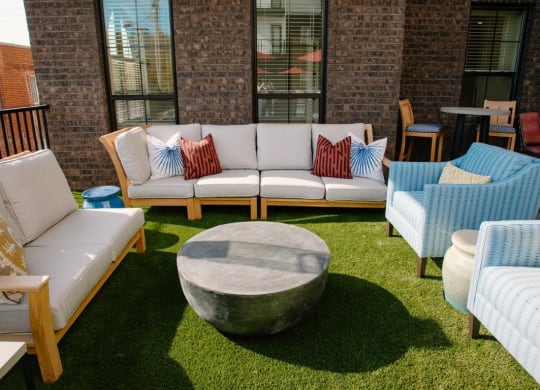 a seating area with couches chairs and a coffee table at Fairfax, Grandview, OH, 43212