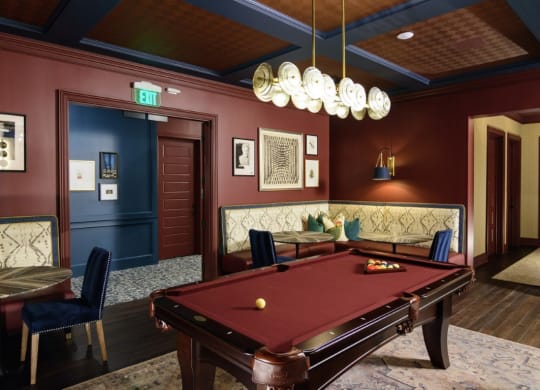 a red pool table in a room with a blue door at Fairfax, Grandview, 43212