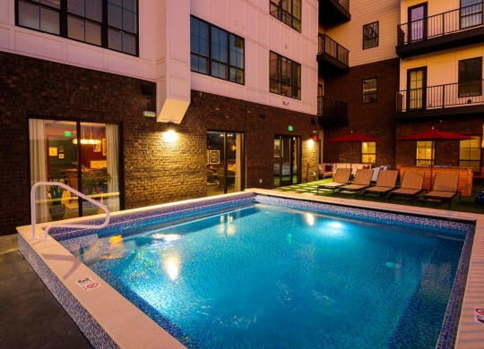 a swimming pool in front of a building at Fairfax, Ohio