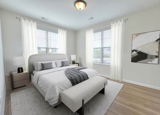 A bedroom with a large bed and a painting on the wall.