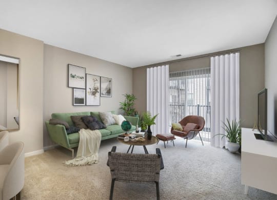 the living room of an apartment with a green couch and chairs