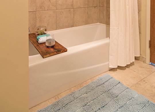 A bathroom with a Bathtub at Grand Wisconsin, Milwaukee, 53203