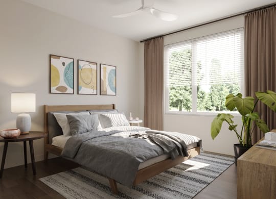 a bedroom with a bed and a large window