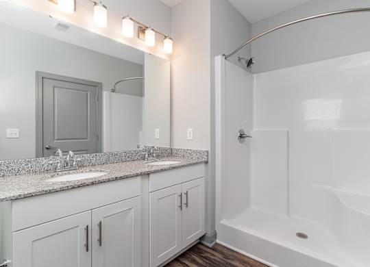 Bathroom with a bathtub and a sink at The Parker Myrtle Beach, Myrtle Beach, SC, 29588