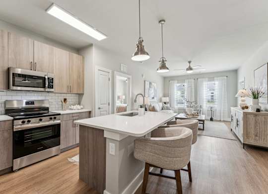 1 bedroom kitchen with island at The Hendry Apartments, Fort Myers