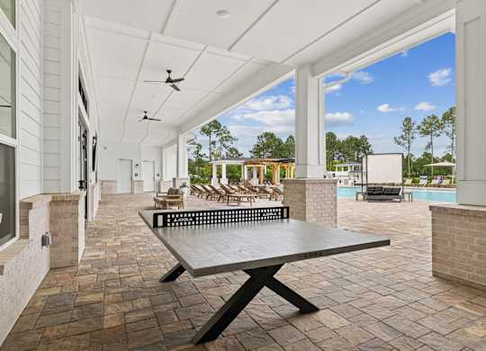 Poolside Table Tennis at The Beacon at 331 Apartments, Santa Rosa Beach, FL