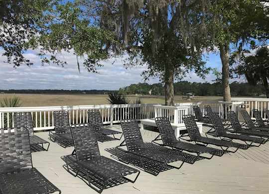 Lounge chairs on deck at West Wind Landing, Savannah, Georgia.