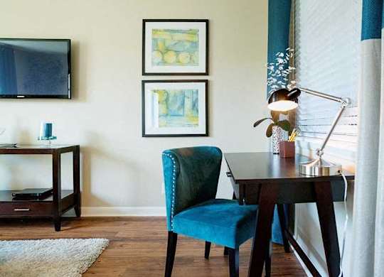 Living room with a desk at Ventana at The Lake, Hendersonville, TN.