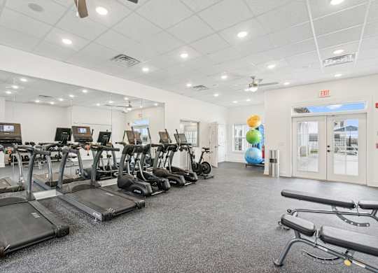 A gym with treadmills and exercise equipment at The Parker North Augusta, North Augusta, South Carolina, 29841